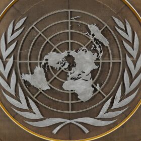 FILE - The United Nations logo is seen inside the 79th session of the United Nations General Assembly, Tuesday, Sept. 24, 2024.