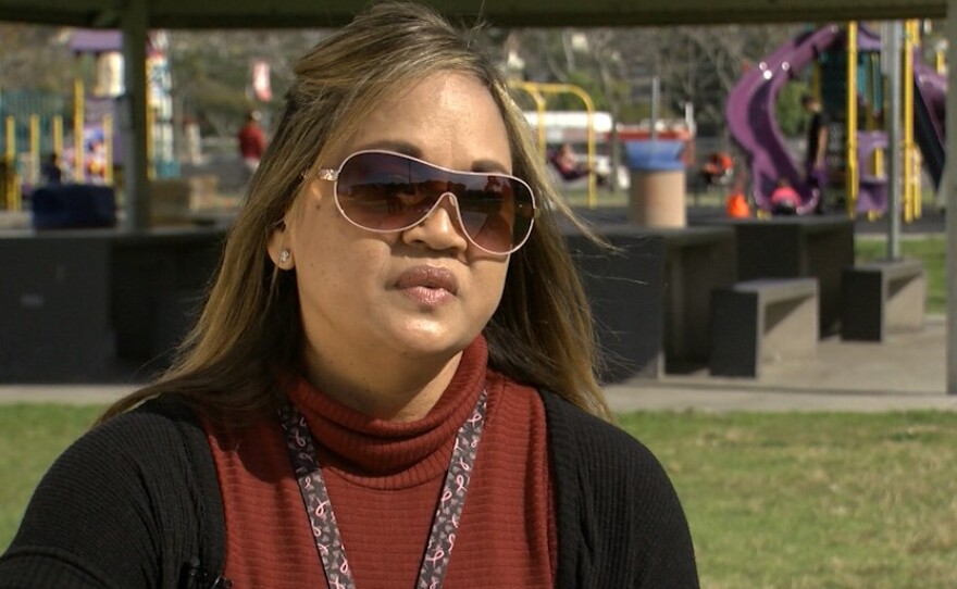 Andrea Kaliki Maestas sits in a Chula Vista park near her job, Feb. 2, 2017.