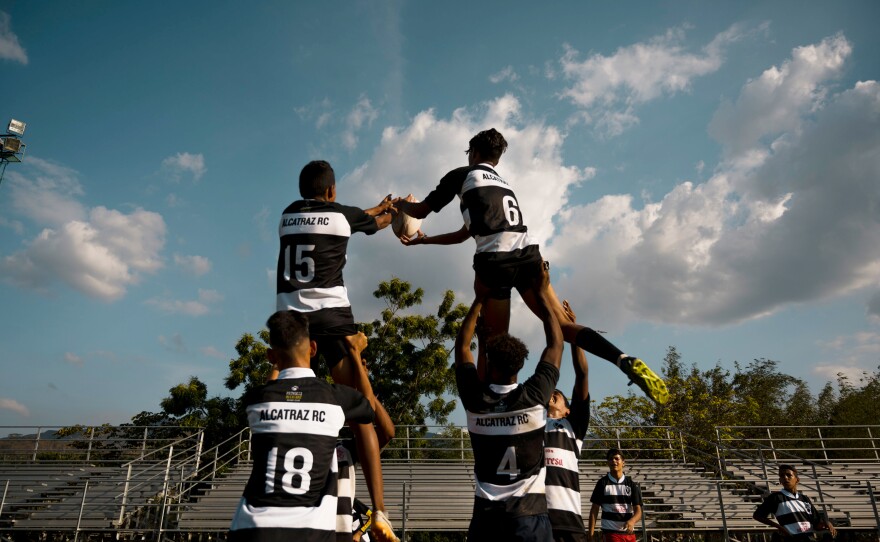 Young men practice rugby at Hacienda Santa Teresa, an estate belonging to a Venezuelan rum company. The estate serves as a practice field for neighboring communities of Aragua state, using rugby to help at-risk youths stay away from criminal life and violence.