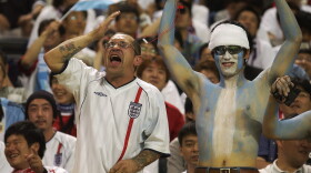 England and Argentina fans sit side by side during the FIFA World Cup match in Sapporo, Japan, on June 7, 2002. England won 1-0. The old rivals meet again this year in a World Cup semifinal showdown.
