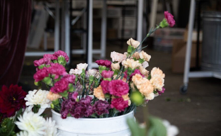 A bucket of flowers is shown inside Native Poppy on Feb. 21, 2024.