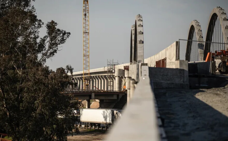 Construction on the high-speed rail project over a ramp above Highway 99 in south Fresno on March 3, 2023.