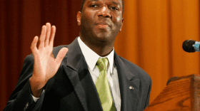 Alvin  Greene, Democratic candidate for the U.S. Senate, waves Sunday after making his first public speech during the monthly meeting of the NAACP in Manning, S.C.