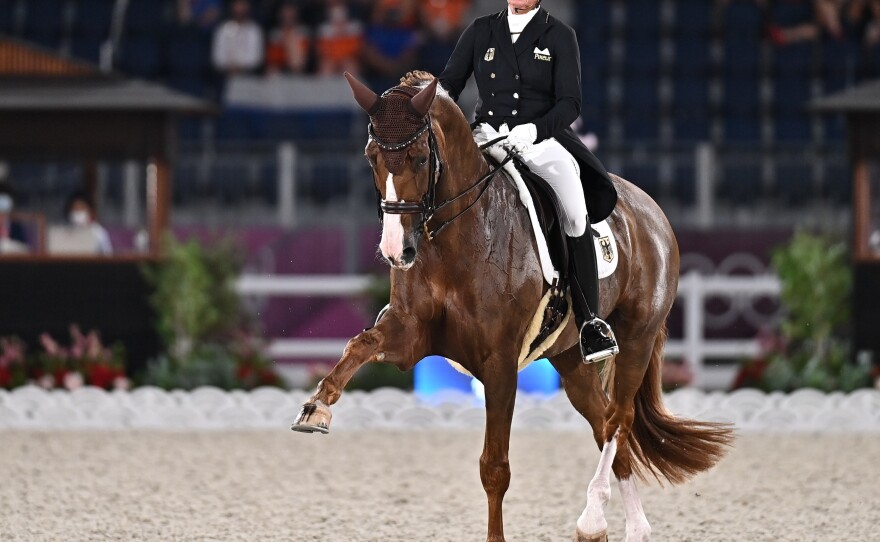 Isabell Werth of Germany competes in the equestrian dressage individual grand prix freestyle at the Tokyo Olympics on July 28.