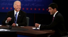 U.S. Vice President Joe Biden (L) listens as Republican vice presidential candidate U.S. Rep. Paul Ryan (R-WI) speaks in the vice presidential debate at Centre College October 11, 2012 in Danville, Kentucky. 