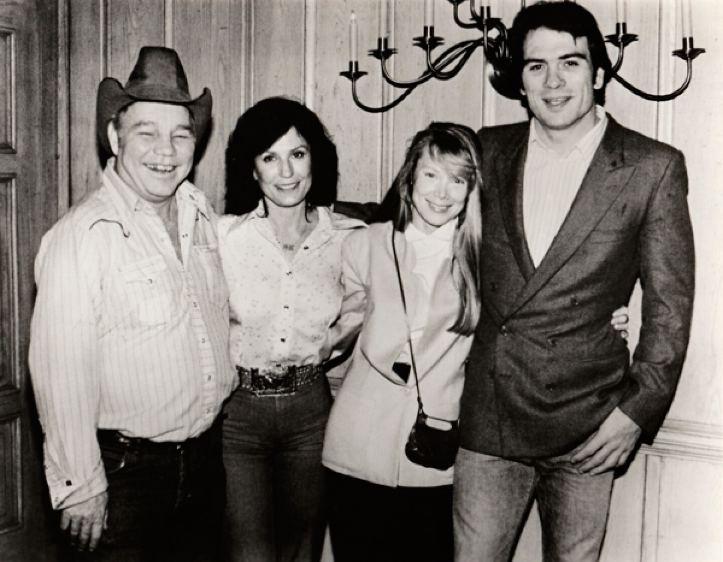 Loretta Lynn's husband Doolittle, Loretta Lynn, Sissy Spacek, and Tommy Lee Jones. Spacek and Jones portrayed Loretta and Doolittle in the 1980 film adaption of Loretta Lynn’s autobiography "Coal Miner’s Daughter."