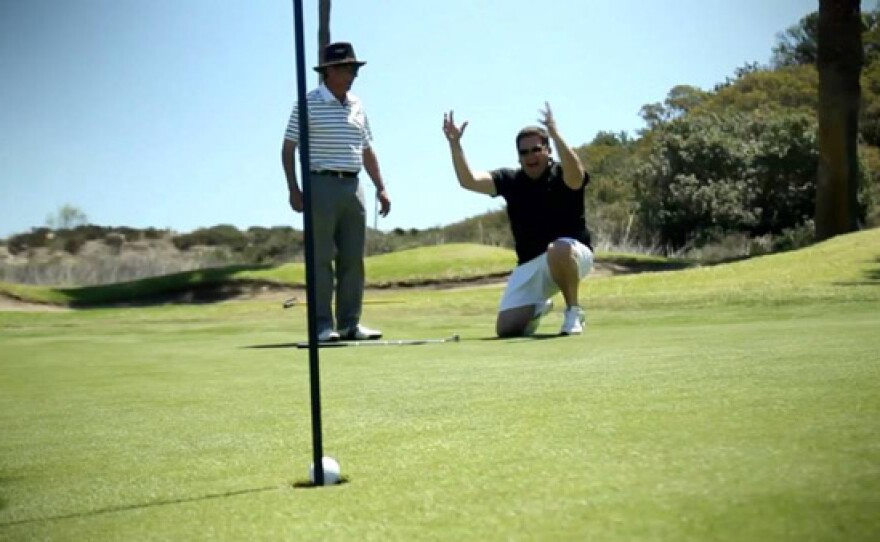 Host Jorge Meraz (right) visits the Bajamar Golf Course where he gets a golf lesson and meets a Tijuana native golf champion.