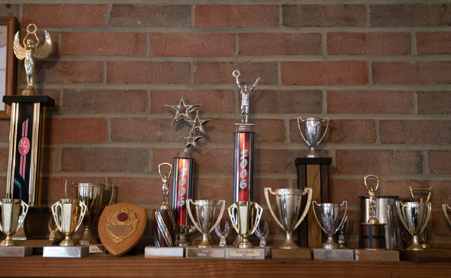 Trophies collected from tiddlywinks competitions over the years.