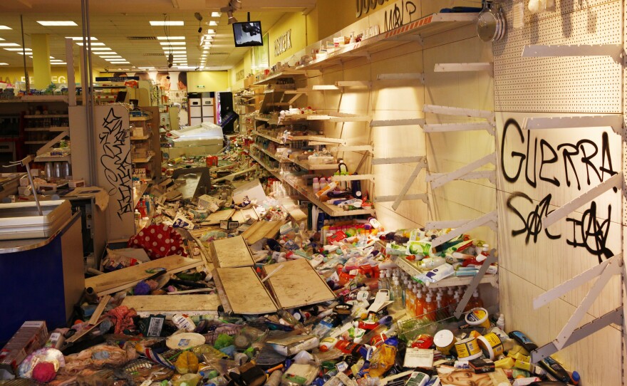 A store that was ravaged by looters during protests against the G-20 Leaders' Summit, is seen in Hamburg, Germany, Saturday.