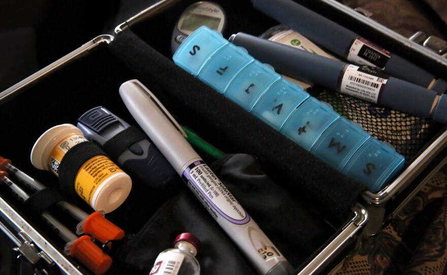 Smith keeps the tools for controlling her diabetes in this kit, which contains metformin, syringes, fast-acting insulin for daytime use and slow-release for overnight.