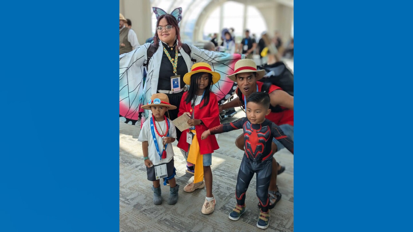 Comic-Con attendees in cosplay pose for a photo on July 26, 2024 at the San Diego Convention Center. From left to right: Calissa Katashima is Shinobu Kocho from "Demon Slayer," Phoenix Ortiz is Portgas D. Ace from "One Piece", Carter and Jimmy Ortiz are both Luffy from "One Piece," and Kai Truong is Spider-Man.