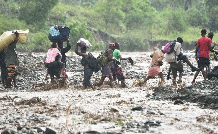 A photo taken Wednesday shows the river La Digue southwest of the capital, Port-au-Prince, where the storm caused the collapse of a bridge on the only road linking the capital to Haiti's southwest.