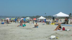 Arizona residents continue to flock to San Diego beaches, even after some threatened to boycott the city over City Council's condemnation of their state's new immigration law.