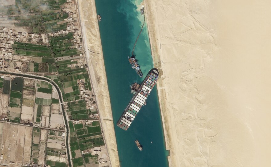 This satellite photo from Planet Labs Inc. shows the Ever Given cargo ship stuck in Egypt's Suez Canal Monday, March 29, 2021.