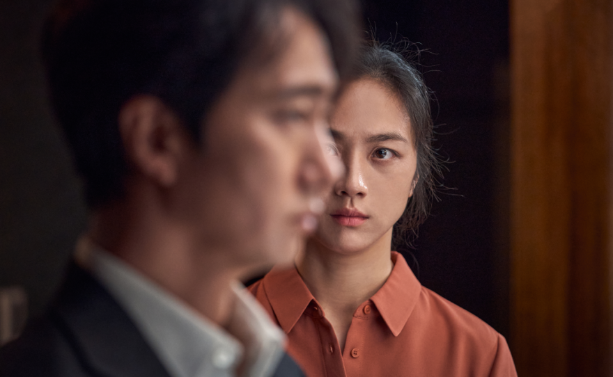 Park Hae-il plays a homicide detective and Tang Wei is the femme fatale he's investigating in<em> Decision to Leave</em>.
