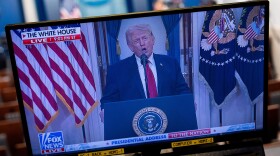 President Trump is seen speaking about the Iran war on a TV in the White House on April 1. Polls have found the war to be unpopular with Americans.