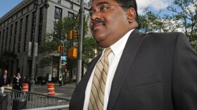 Raj Rajaratnam, billionaire co-founder of Galleon Group, enters Manhattan federal court on Wednesday.