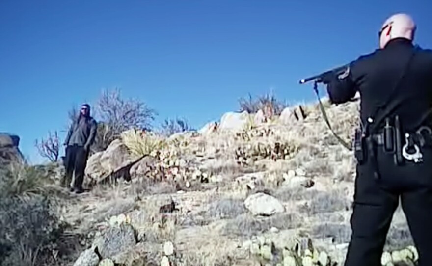 An image from a March 2014 video shows 38-year-old James Boyd (left) before he was fatally shot during a standoff with Albuquerque police officers.