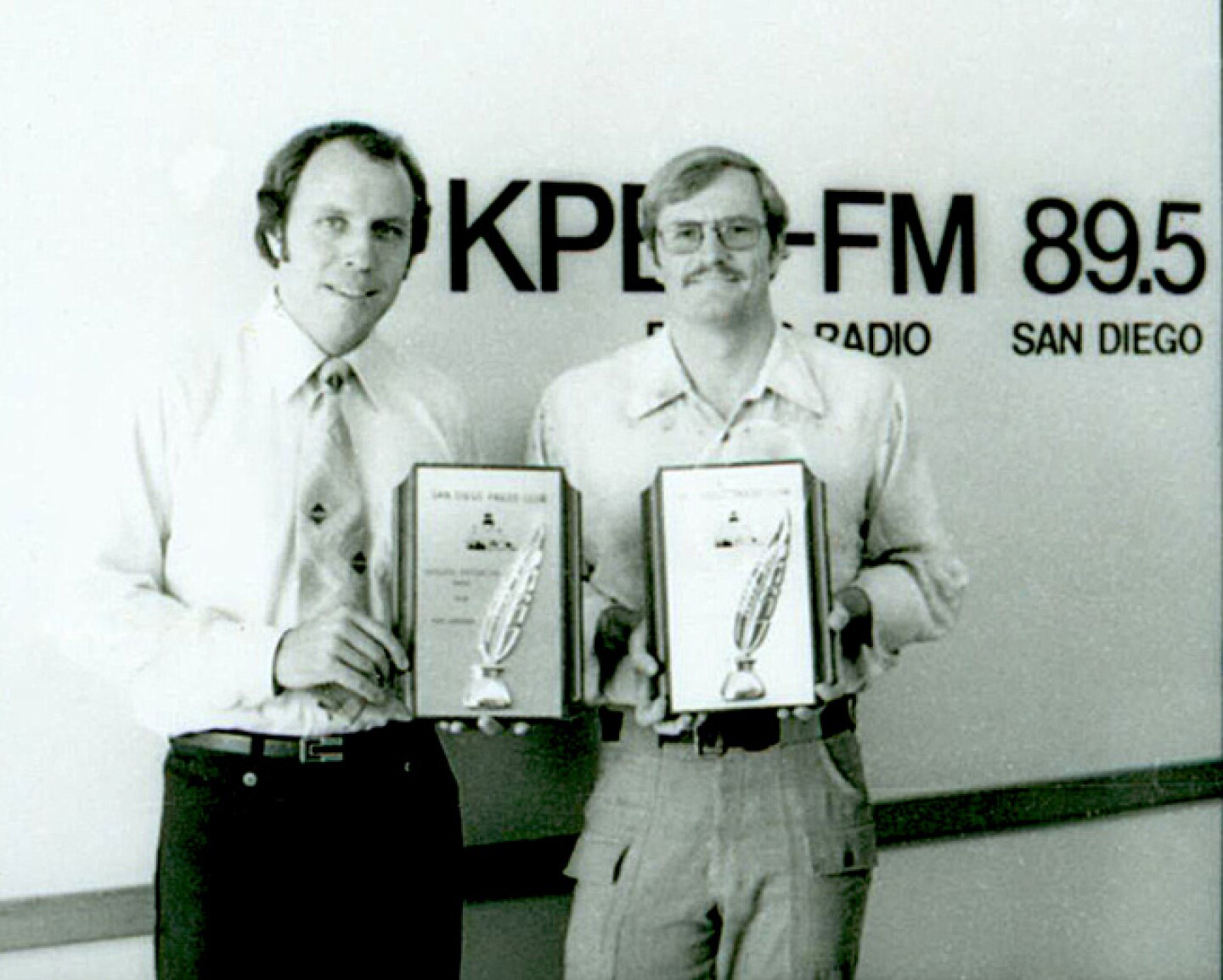 During his stint at KPBS, Ken Kramer won several awards for his work in journalism, including this one in 1978 from the San Diego Press Club. Pictured with Ken is Ed Bremer.