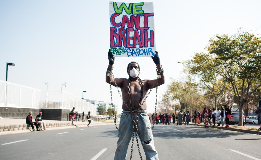Members of Economic Freedom Fighters (EFF) protest against the death of George Floyd outside U.S. Consulate in solidarity with Black Lives Matter movement on June 8, 2020 in Sandton, South Africa.