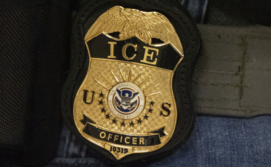A federal agent wears an Immigration and Customs Enforcement badge in New York, June 10, 2025. The ICE officer who allegedly fatally shot a Colombian man in Maine on Monday was prone to violence and held racist beliefs, according to some of the people who were close to him.