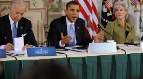President Barack Obama gives his opening remarks during a bipartisan meeting to discuss health reform legislation with congressional members at the Blair House as Vice President Joe Biden and Kathleen Sebelius, Health and Human Services Secretary, listen February 25, 2010 in Washington, DC.