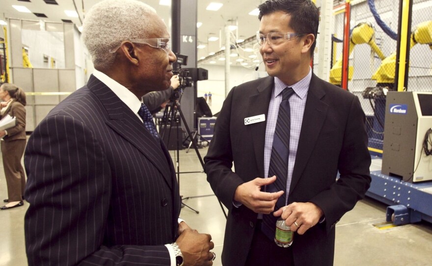 Memphis Mayor A C Wharton (left) with Jack Truong of Electrolux at the company's new plant. The city used a large incentive package to entice the company.