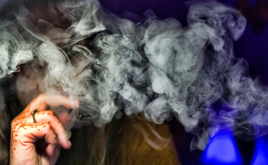 U.S. health officials are again urging people to stop vaping until experts figure out why some are coming down with serious respiratory illnesses.