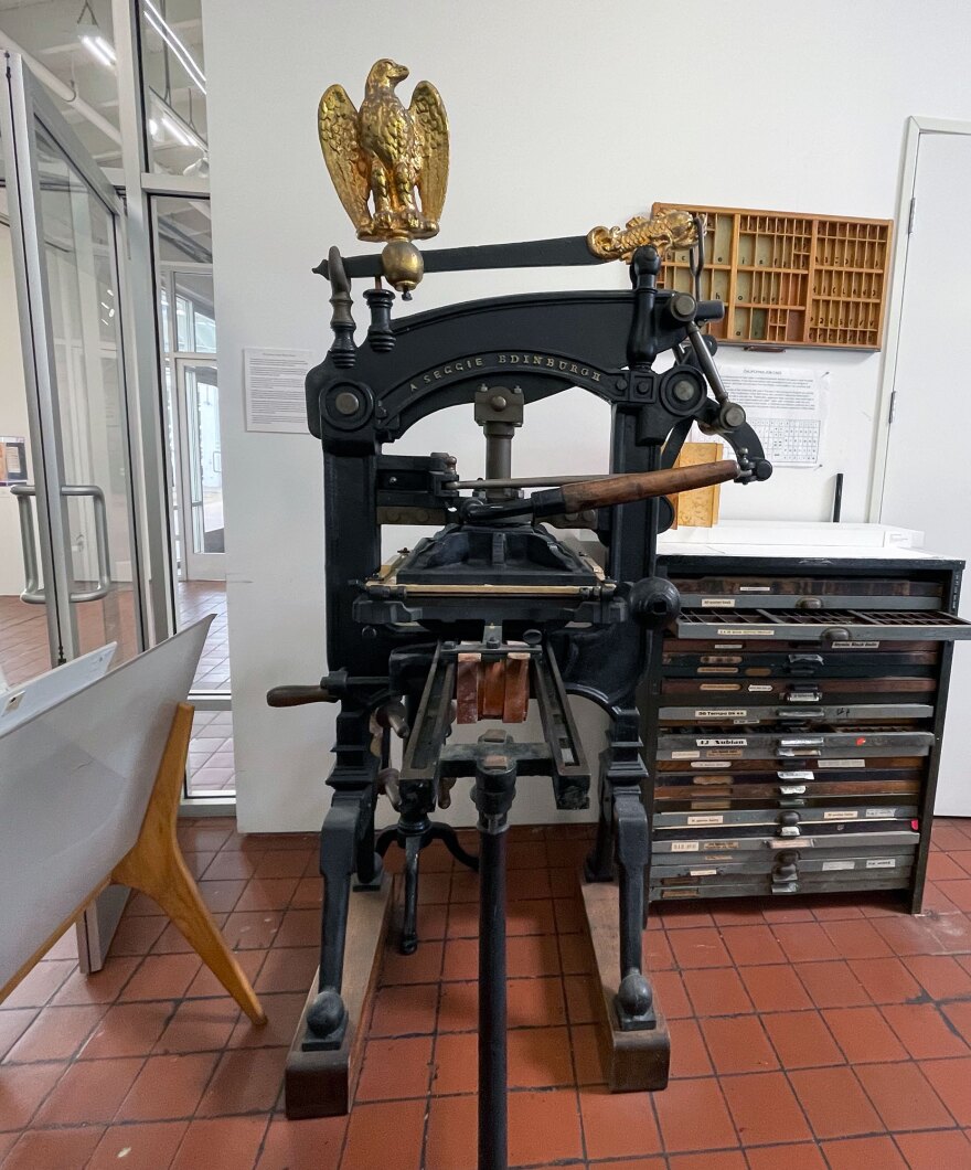 An antique Seggie Edinburgh hand iron printing press is shown at the AAC Print Studio on Dec. 19, 2022.