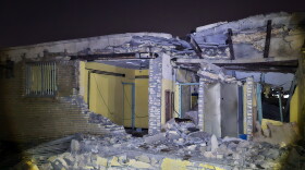 Damage is seen at a building that Iranian media said was hit in a U.S. strike in Kuhestak, southern Iran, early Wednesday.