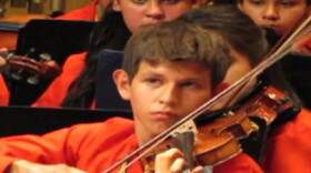 Members of the Azteca Sangre Orchestra play during the group's debut concert in June in Ciudad Juárez.