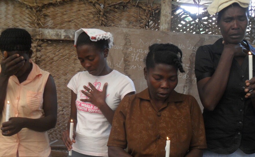 Mourners attend a memorial service for recent cholera victims in Haiti that took place Wednesday  in Savanette, an isolated community in the mountains outside Mirebalais, Haiti.