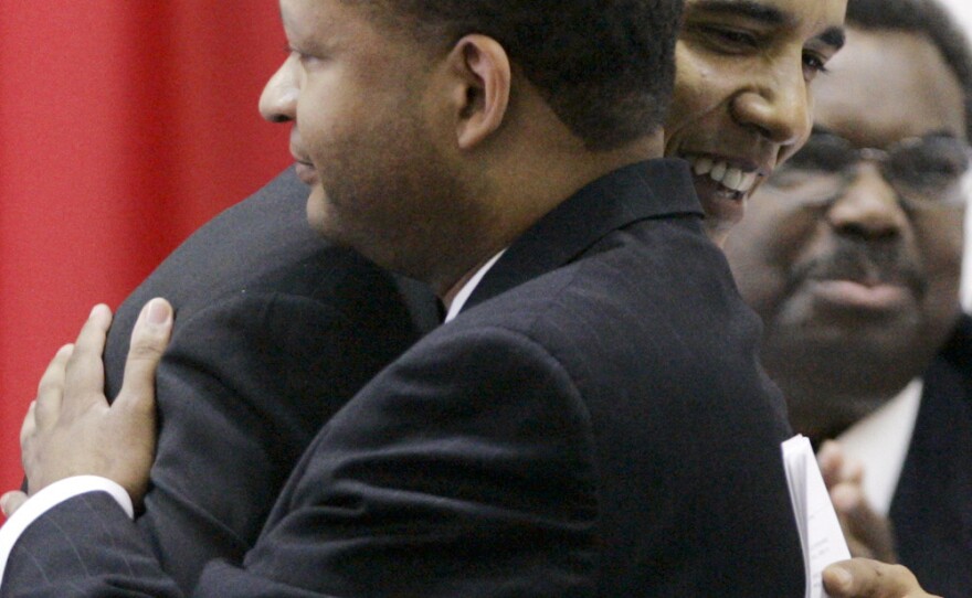 Barack Obama, then a Democratic candidate for president, hugs former U.S. Rep. Artur Davis, in Selma, Ala., in 2007.
