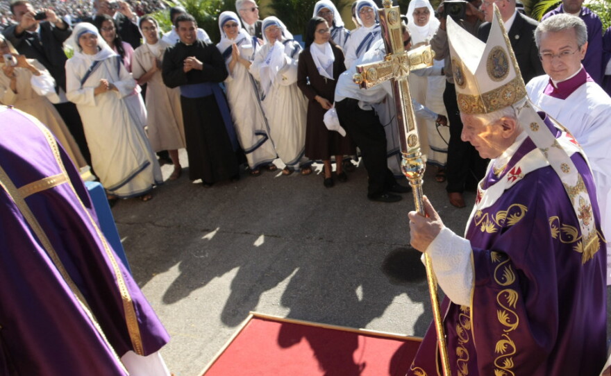 Pope Benedict arrives in Havana's Revolution Square for an open-air Mass on Wednesday. Hundreds of thousands attended on the final day of the pope's visit to Cuba.