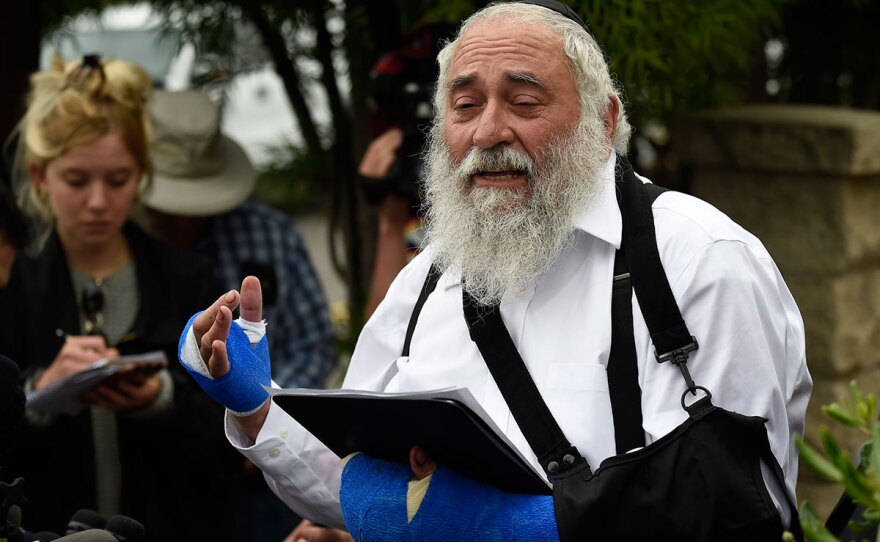 Rabbi Yisroel Goldstein speaks at a news conference at the Chabad of Poway synagogue, Sunday, April 28, 2019, in Poway, Calif.