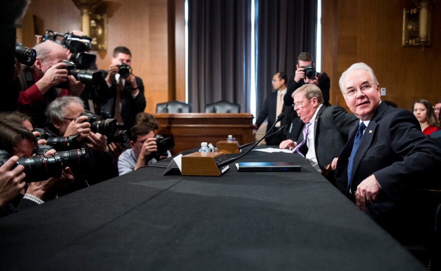 Secretary of Health and Human Services nominee Rep. Tom Price, R-Ga., (right) and Sen. Johnny Isakson, R-Ga., get settled before the start of Price's confirmation hearing Wednesday before the Senate Health, Education, Labor and Pensions Committee.