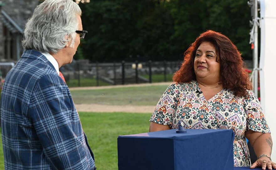 Kevin Zavian (left) appraises fancy yellow diamond ring, ca. 1950, in Sands Point, N.Y. ANTIQUES ROADSHOW 2021 Tour in Sands Point, N.Y.