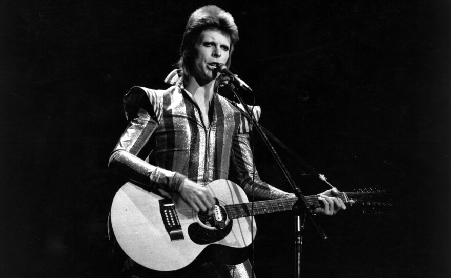 Bowie performs as Ziggy Stardust at the Hammersmith Odeon in London on July 3, 1973.