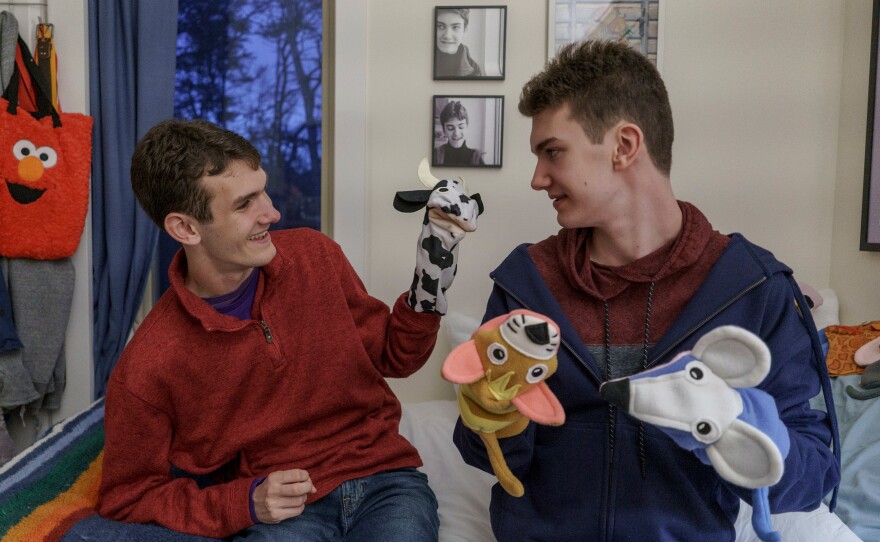 Early in life, Sam (left) and John were much more similar than they may seem today. "They both did not wave, they didn't respond to their name, they both had a lot of repetitive movements," says their mother, Kim Leaird.