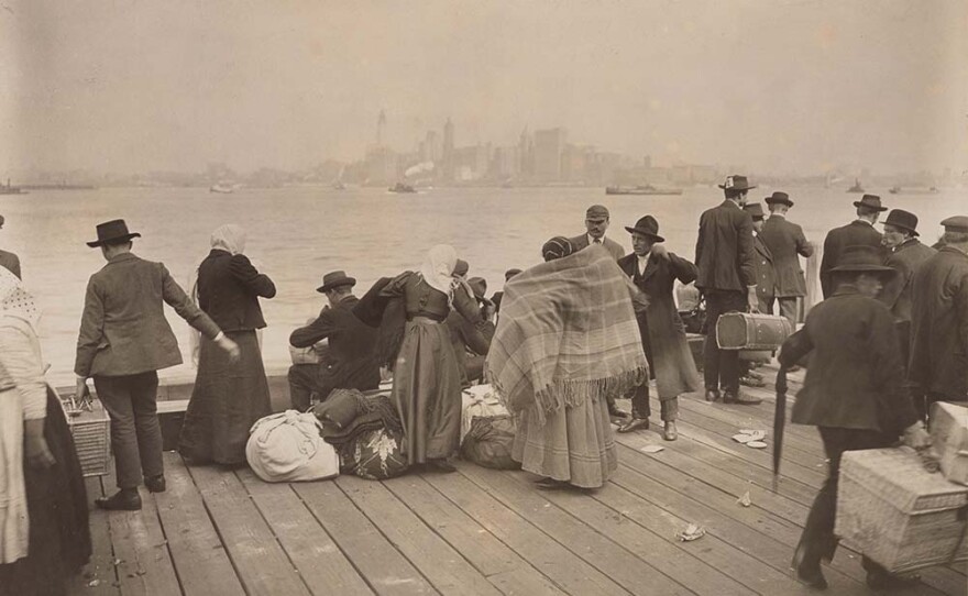 Immigrants awaiting transfer, Ellis Island, October 30, 1912.