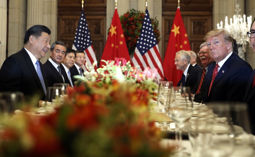 In this Dec. 1 photo, President Donald Trump and Chinese President Xi Jinping meet over dinner at the G20 Summit in Buenos Aires, Argentina. The two have negotiated a truce in an expensive and ongoing trade war.