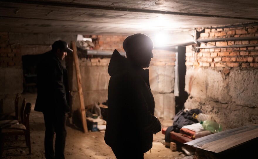 Zahorodnikh stands in the basement of her building where she sheltered while Izium was under Russian occupation.