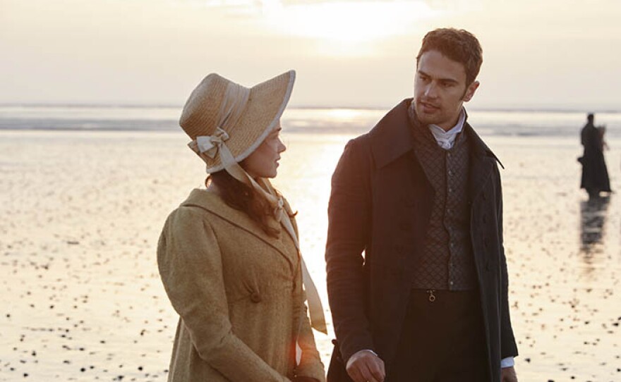 Shown from left to right: Rose Williams as Charlotte Heywood and Theo James as Sidney Parker.