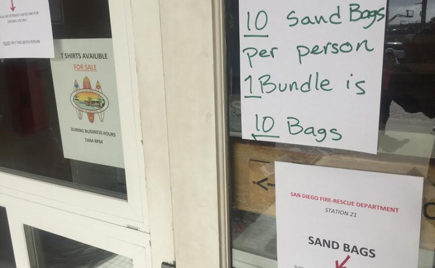 Sign offering free sandbags on the door of San Diego Fire Station 21, Jan. 6, 2016.