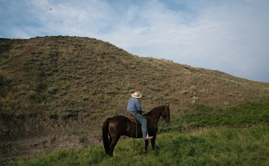 Craig French rides a horse on his ranchland. While some ranchers in this pocket of the Great Plains overgrazed their spreads and plowed up native grasses, most did a good job taking care of it.