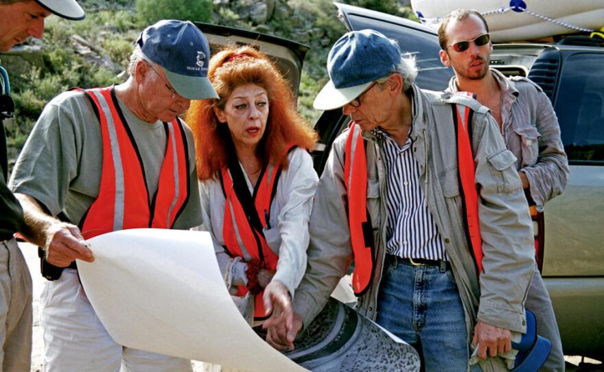 Christo, Jeanne-Claude and their team at work in the Arkansas River valley, Colorado, August 2000
