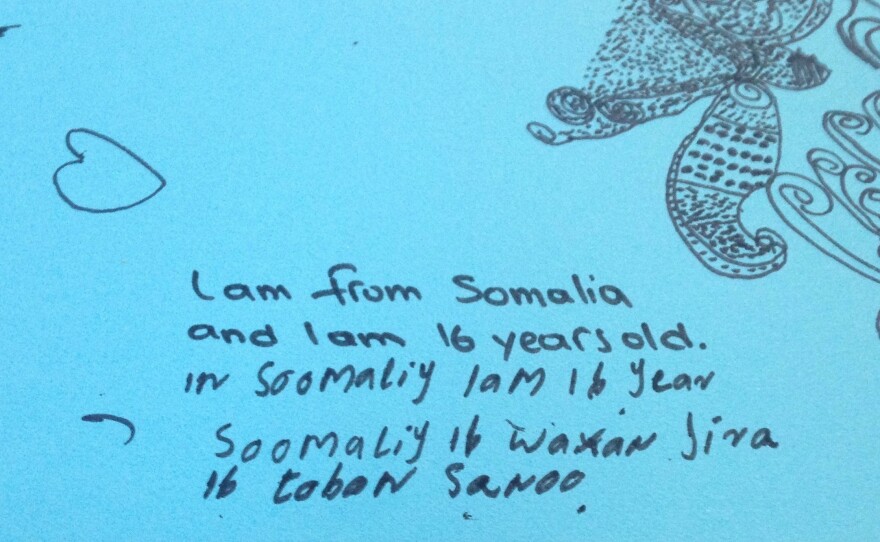 A 16-year-old Somali girl who gives her name as Ayana communicates by drawing and writing out the few English words she knows. She's withdrawn and won't say where she wants to go.