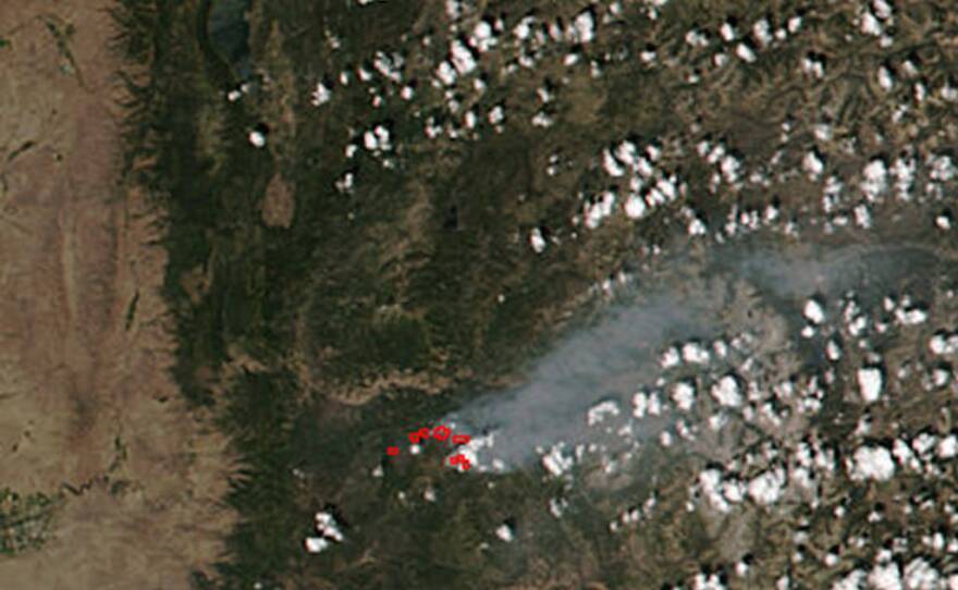 A NASA satellite image captured July 28 shows the smoke plume from the Pioneer Fire. The blaze is 13 times larger now.