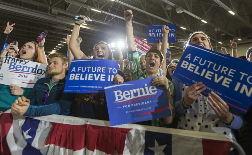 Supporters of Democratic presidential candidate Sen. Bernie Sanders cheer at a campaign stop Saturday in Madison, Wis.