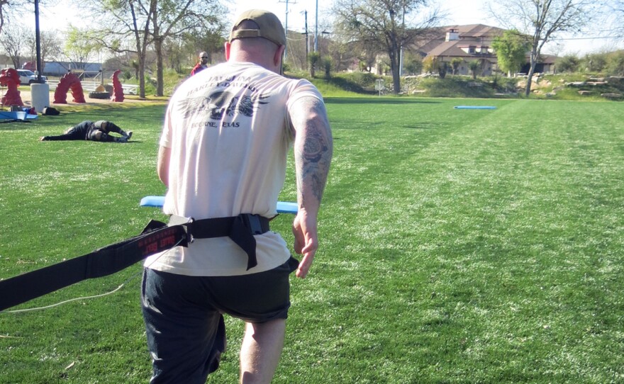 Army Spc. Joey McElroy practices resistance running with the IDEO. Soldiers who are fitted with the brace spend four weeks learning how to use it in a "Return to Run" program.